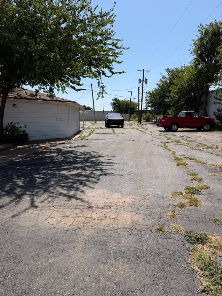 The parking lot behind the building